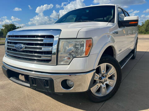 2013 Ford F-150 for sale at AUTO DIRECT Bellaire in Houston TX