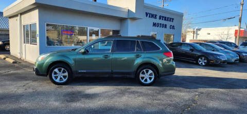 2013 Subaru Outback for sale at VINE STREET MOTOR CO in Urbana IL