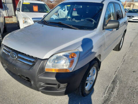 2008 Kia Sportage for sale at Howe's Auto Sales in Lowell MA