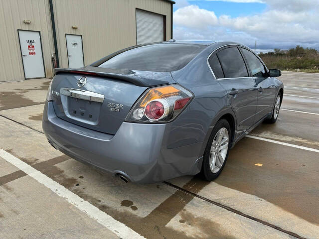 2012 Nissan Altima for sale at CAR MARKET AUTO GROUP in Sugar Land, TX