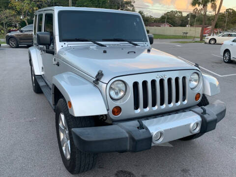 2011 Jeep Wrangler Unlimited for sale at Consumer Auto Credit in Tampa FL