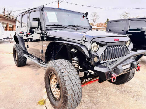 2011 Jeep Wrangler Unlimited for sale at CE Auto Sales in Baytown TX