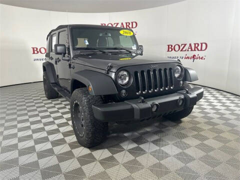 2018 Jeep Wrangler JK Unlimited for sale at BOZARD FORD in Saint Augustine FL