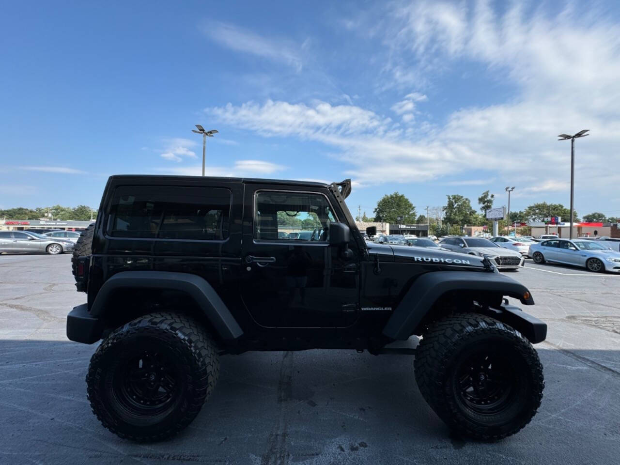 2012 Jeep Wrangler for sale at Opus Motorcars in Utica, MI