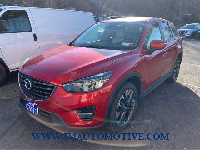 2016 Mazda CX-5 for sale at J & M Automotive in Naugatuck CT