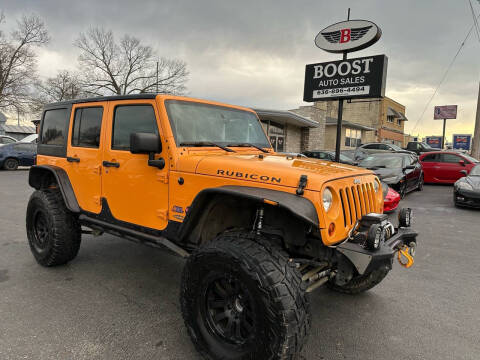 2013 Jeep Wrangler Unlimited for sale at BOOST AUTO SALES in Saint Louis MO