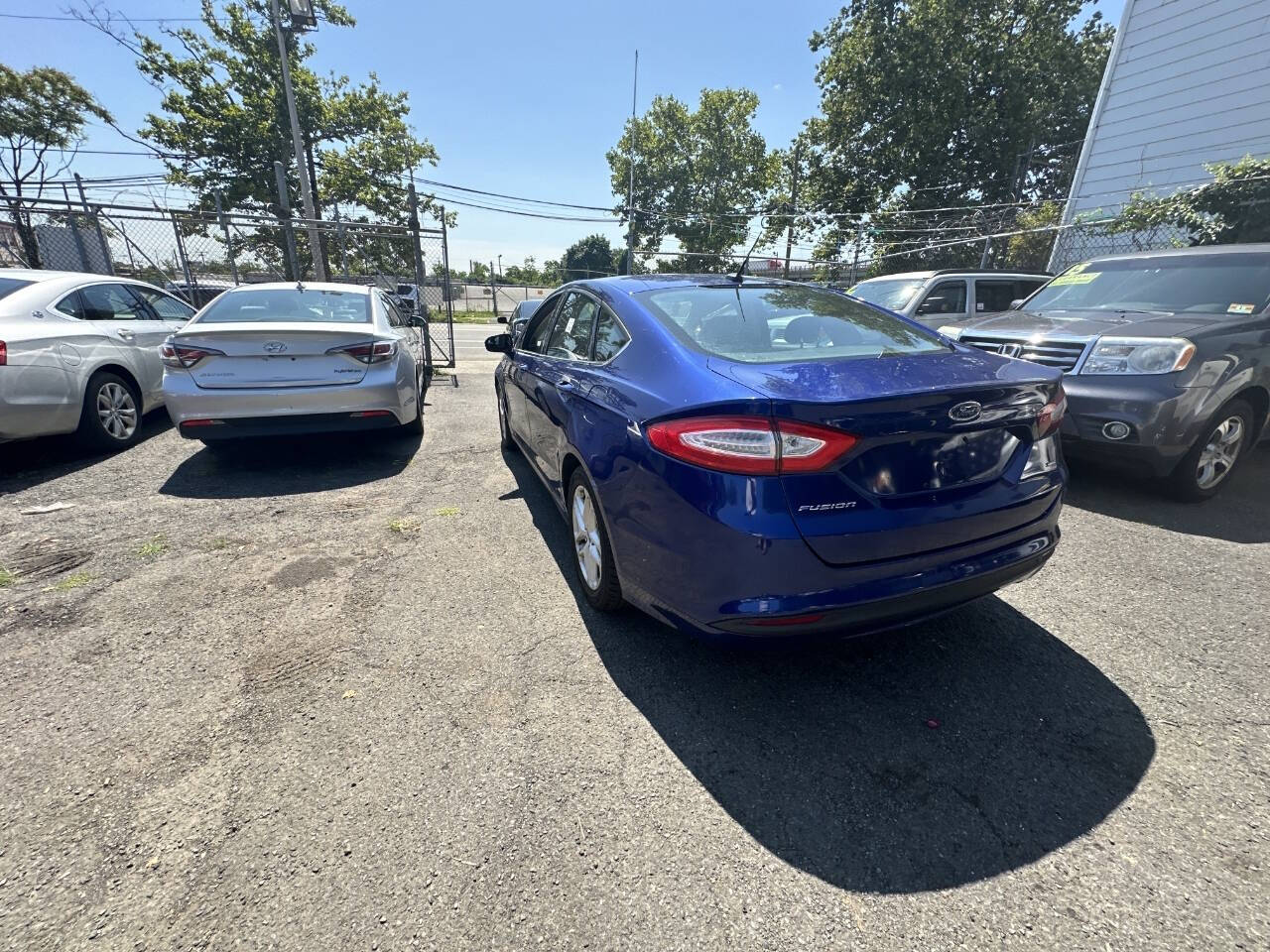 2014 Ford Fusion for sale at 77 Auto Mall in Newark, NJ