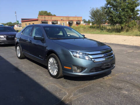 2012 Ford Fusion Hybrid for sale at Bruns & Sons Auto in Plover WI