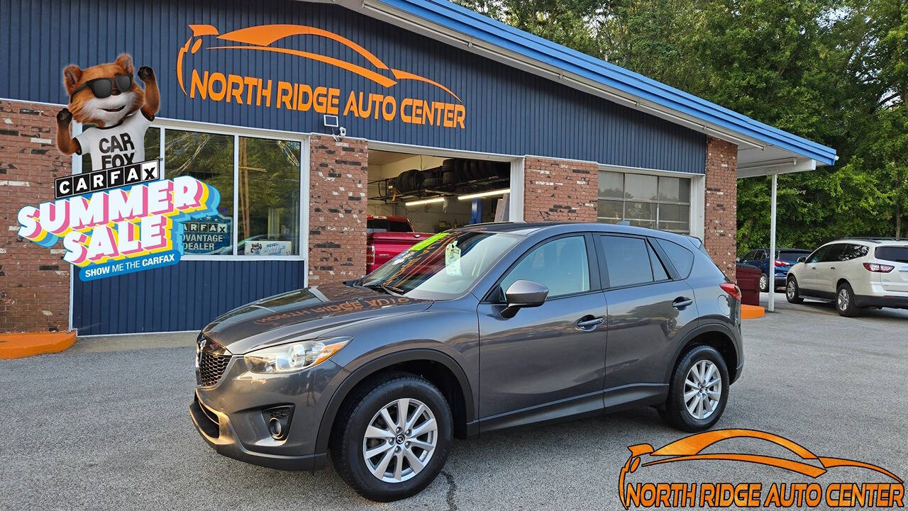 2015 Mazda CX-5 for sale at North Ridge Auto Center LLC in Madison, OH