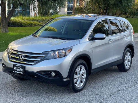 2014 Honda CR-V for sale at MILLENNIUM MOTORS in Van Nuys CA