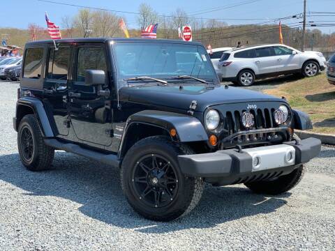 2011 Jeep Wrangler Unlimited for sale at A&M Auto Sales in Edgewood MD