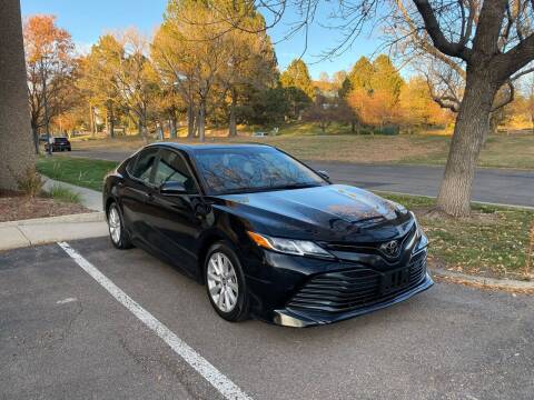 2018 Toyota Camry for sale at QUEST MOTORS in Englewood CO