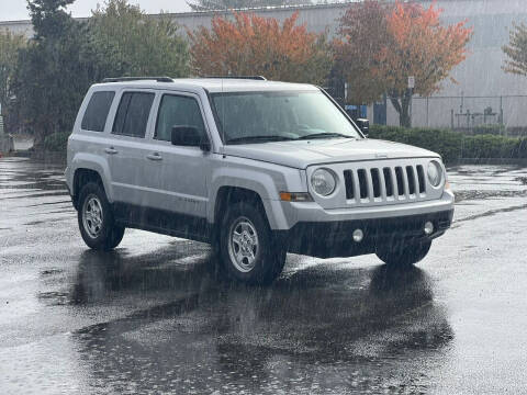 2013 Jeep Patriot for sale at ICAR MOTORS LLC in Auburn WA