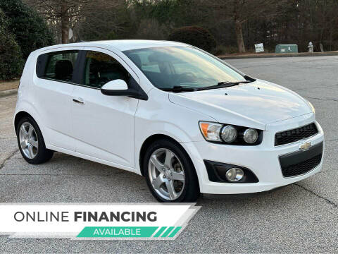 2014 Chevrolet Sonic for sale at Two Brothers Auto Sales in Loganville GA