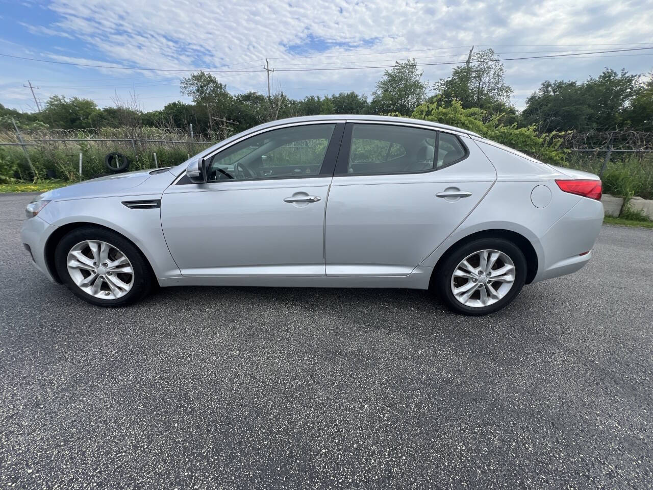 2012 Kia Optima for sale at J & J Motors in Milwaukee, WI