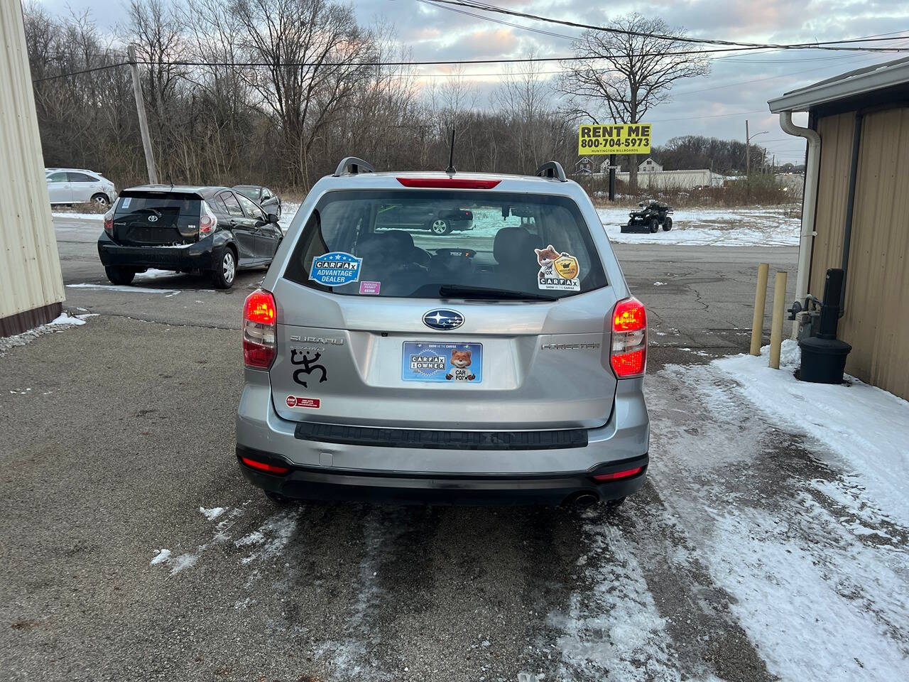 2014 Subaru Forester for sale at BNM AUTO GROUP in GIRARD, OH