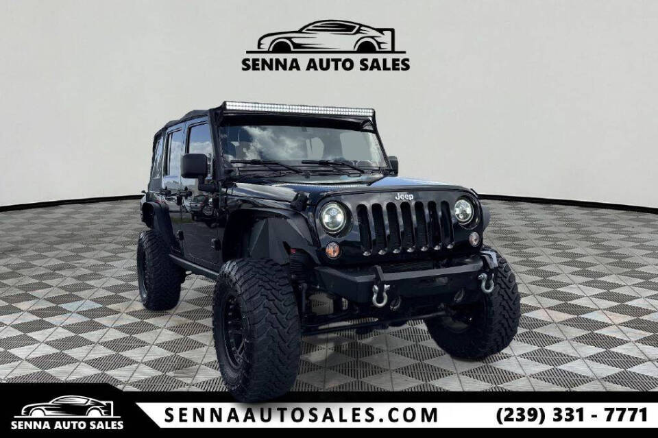 2015 Jeep Wrangler Unlimited for sale at SENNA AUTO SALES in Naples, FL