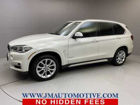 2014 BMW X5 for sale at J & M Automotive in Naugatuck CT