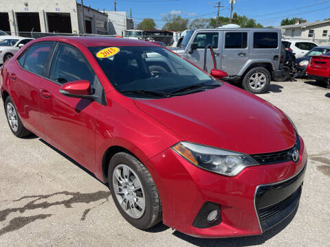 2015 Toyota Corolla for sale at Unique Auto Group in Indianapolis IN
