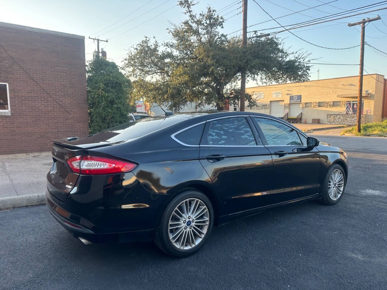 2016 Ford Fusion for sale at Sarenco Auto Inc in Dallas, TX