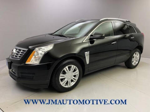 2015 Cadillac SRX for sale at J & M Automotive in Naugatuck CT
