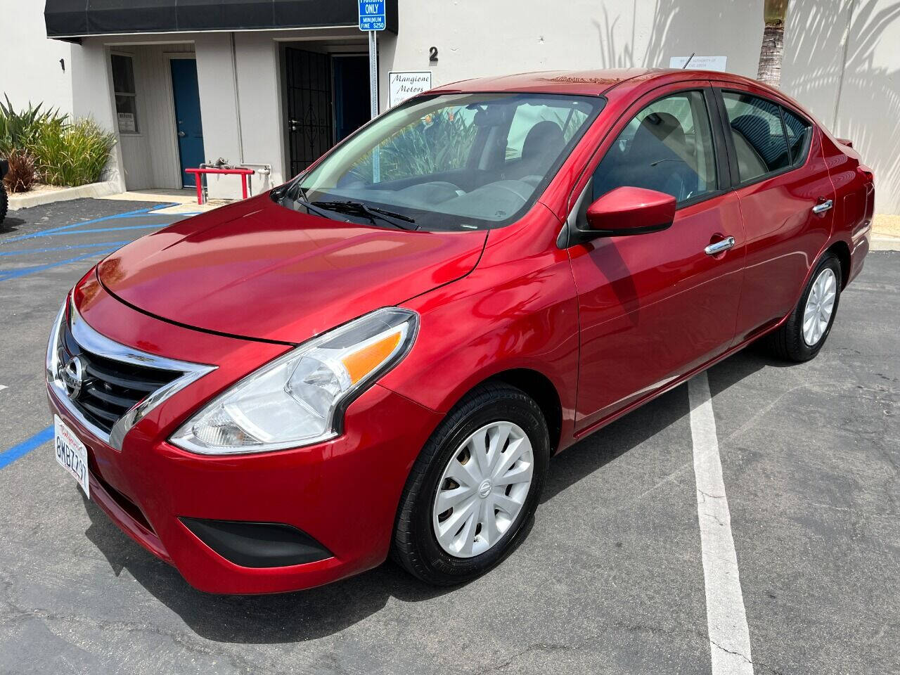 2016 red nissan versa