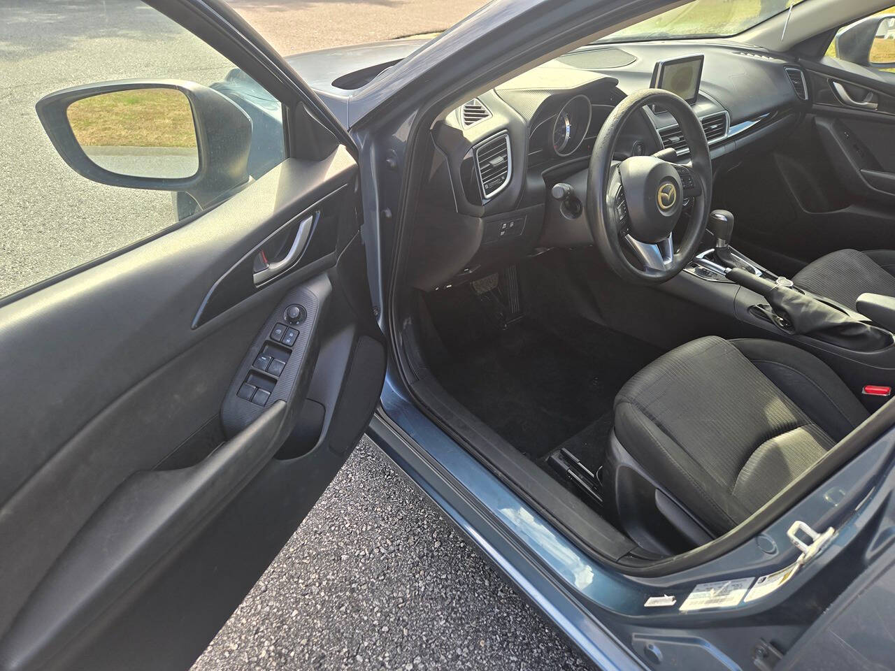 2016 Mazda Mazda3 for sale at Connected Auto Group in Macon, GA