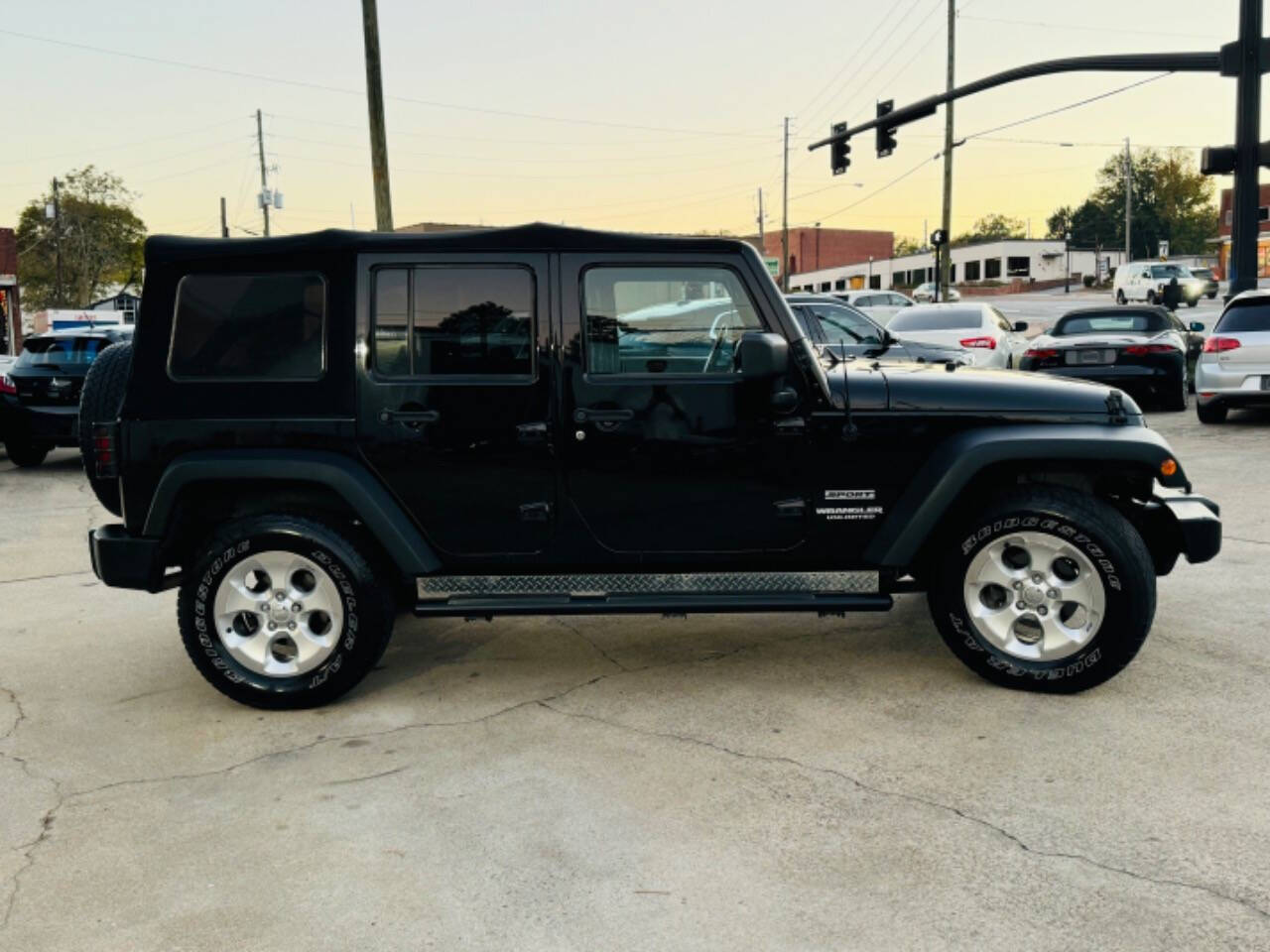 2012 Jeep Wrangler Unlimited for sale at AUTO LUX INC in Marietta, GA