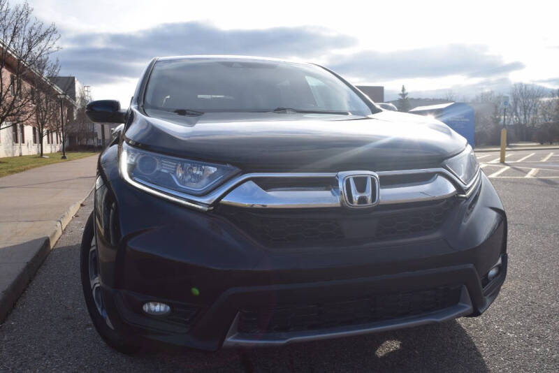 2018 Honda CR-V for sale at QUEST AUTO GROUP LLC in Redford MI