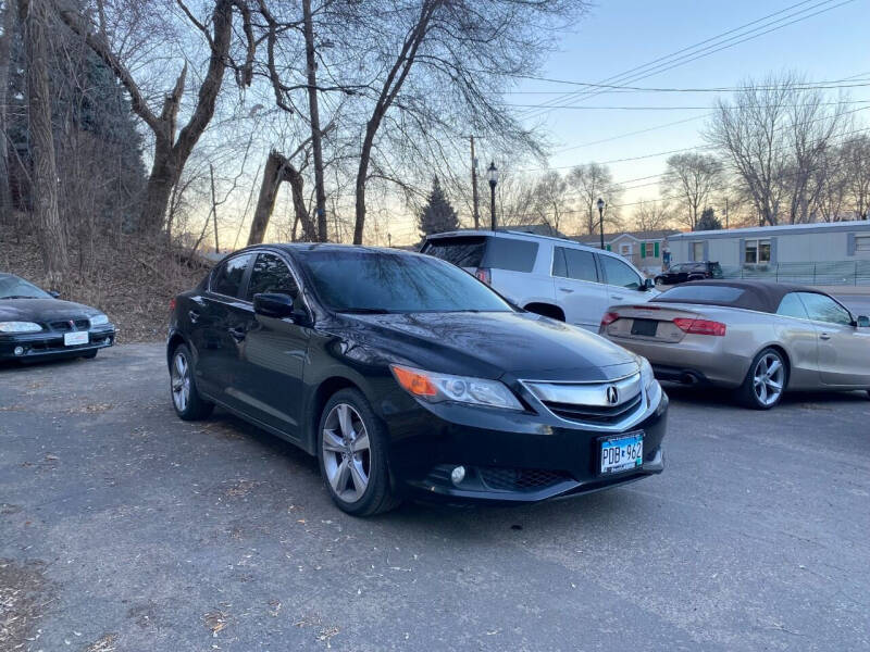 2013 Acura ILX for sale at Rams Auto Sales LLC in South Saint Paul MN