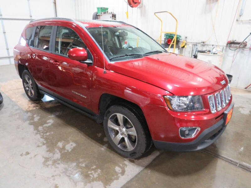 Used 2016 Jeep Compass High Altitude with VIN 1C4NJDEB5GD557672 for sale in Pierre, SD