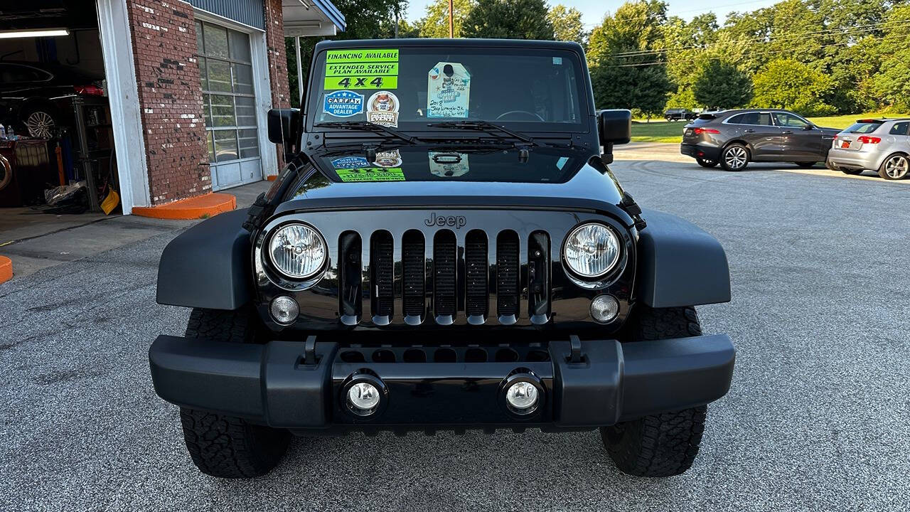 2018 Jeep Wrangler JK Unlimited for sale at North Ridge Auto Center LLC in Madison, OH