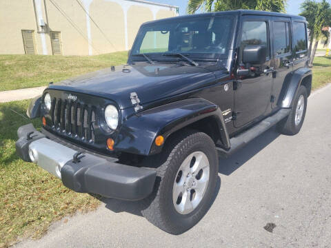 2013 Jeep Wrangler Unlimited for sale at Maxicars Auto Sales in West Park FL