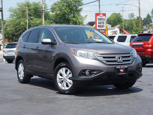 2012 Honda CR-V for sale at SWISS AUTO MART in Sugarcreek OH