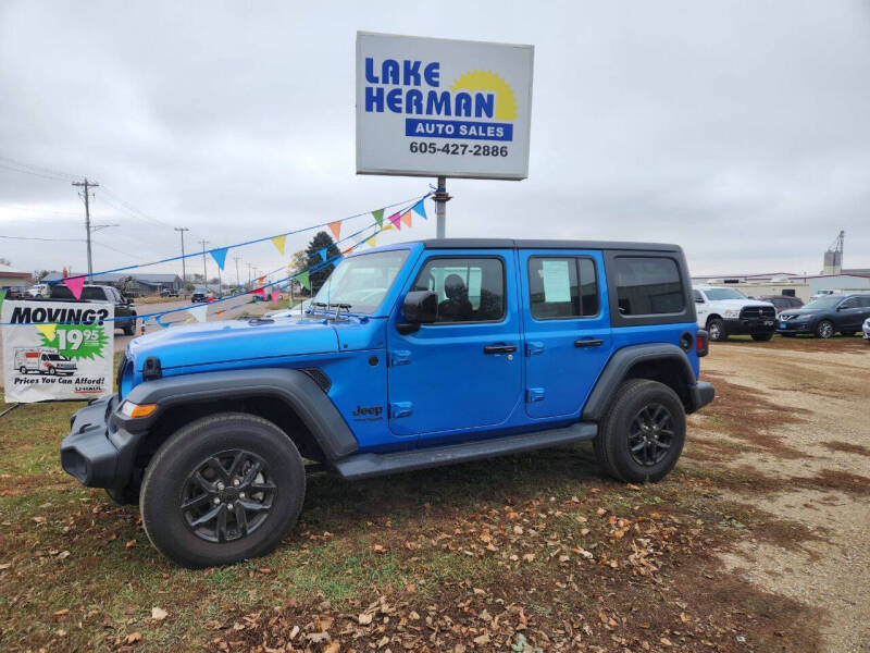 Used 2022 Jeep Wrangler Unlimited Sport with VIN 1C4HJXDN5NW232063 for sale in Madison, SD