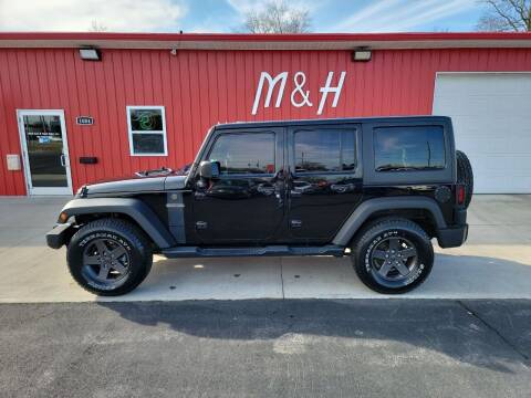 2016 Jeep Wrangler Unlimited for sale at M & H Auto & Truck Sales Inc. in Marion IN