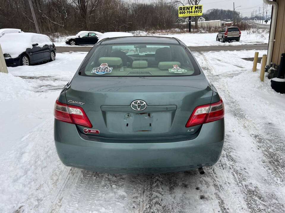 2009 Toyota Camry for sale at BNM AUTO GROUP in GIRARD, OH