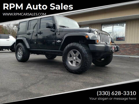 2013 Jeep Wrangler Unlimited for sale at RPM Auto Sales in Mogadore OH