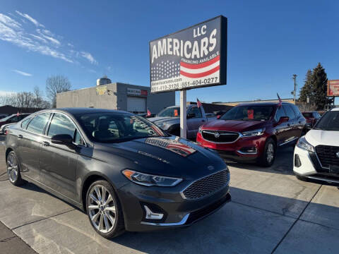 2019 Ford Fusion for sale at Americars LLC in Osseo MN