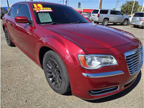 2014 Chrysler 300 for sale at MERCED AUTO WORLD in Merced CA