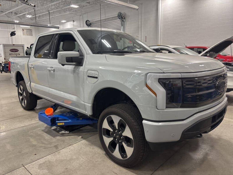 Used 2023 Ford F-150 Lightning Platinum with VIN 1FT6W1EV2PWG12064 for sale in Loganville, GA