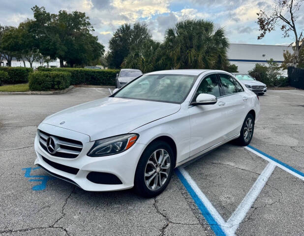 2015 Mercedes-Benz C-Class for sale at Zoom Auto Exchange LLC in Orlando, FL