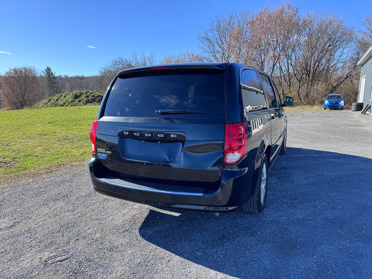 2015 Dodge Grand Caravan for sale at Riverside Motors in Glenfield, NY