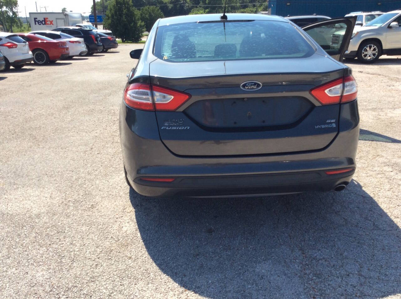 2016 Ford Fusion Hybrid for sale at SPRINGTIME MOTORS in Huntsville, TX