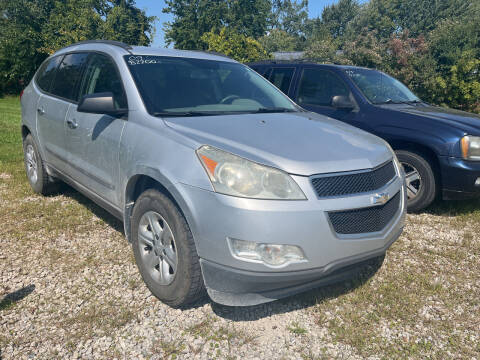 2009 Chevrolet Traverse for sale at HEDGES USED CARS in Carleton MI