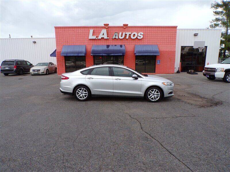 2013 Ford Fusion for sale at L A AUTOS in Omaha NE