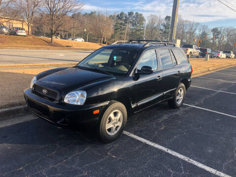 2004 Hyundai Santa Fe for sale at Another Satisfied Customer Auto Brokers LLC in Marietta GA