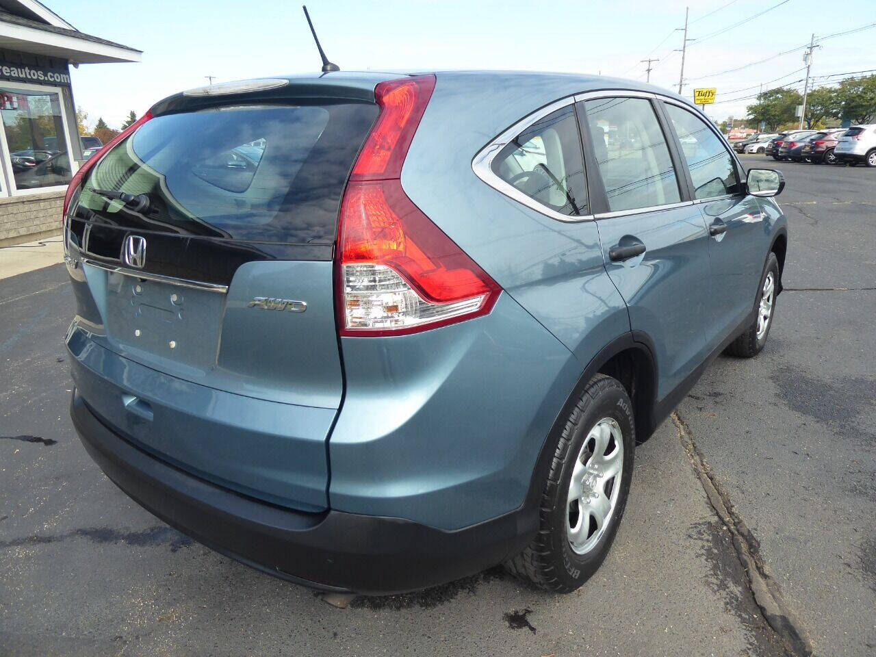 2014 Honda CR-V for sale at Lakeshore Autos in Holland, MI