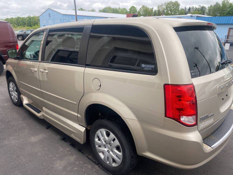 Used 2015 Dodge Grand Caravan SE with VIN 2C4RDGBG2FR691884 for sale in Spencerport, NY