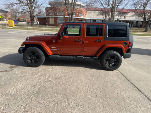 2014 Jeep Wrangler Unlimited for sale at Mulder Auto Tire and Lube in Orange City IA